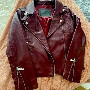 Girls size 10 maroon leather jacket.